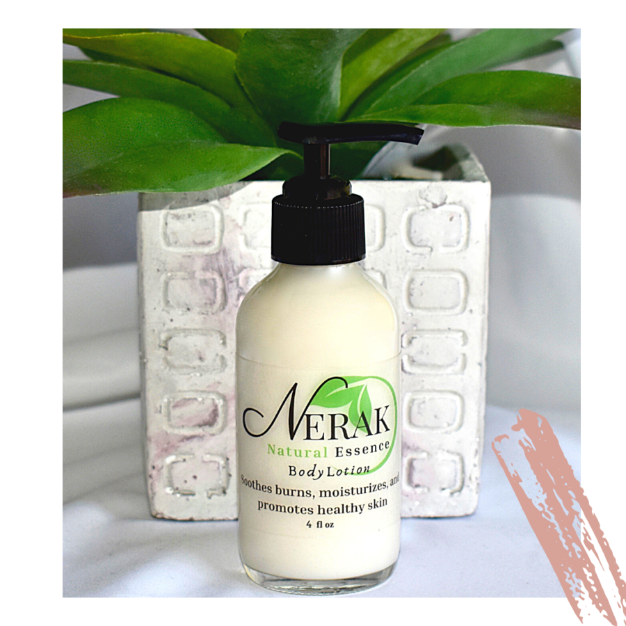 Clear bottle of NERAK Lotion with black top. Plant in the background